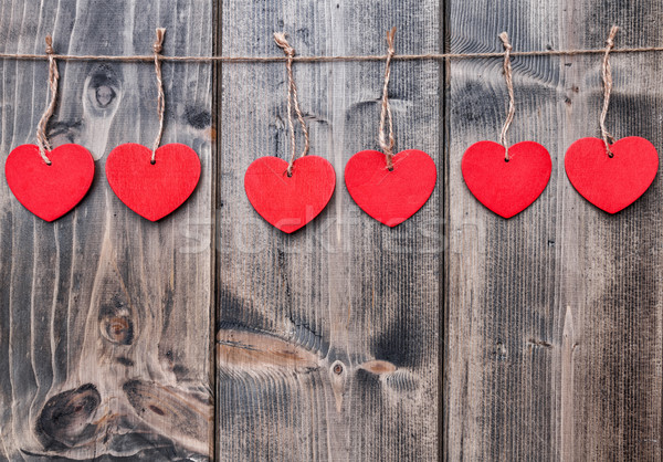 Love concept. Hearts hanging on a string Stock photo © tommyandone