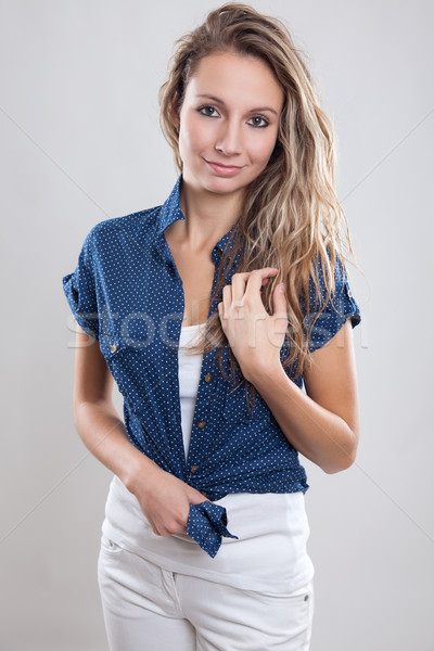 Bonne recherche jeune femme vêtements modèle Photo stock © tommyandone