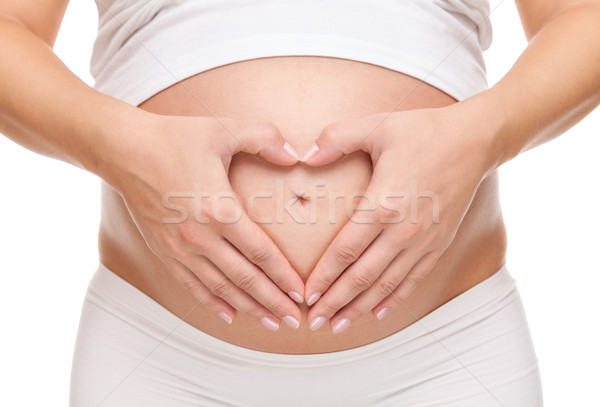 Pregnant woman loving her baby Stock photo © tommyandone