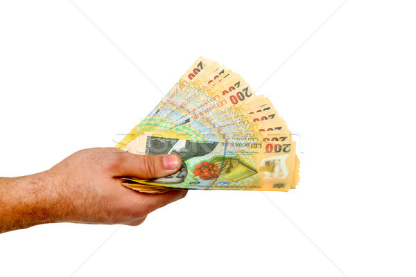 Stockfoto: Roemeense · geld · hand · geïsoleerd · witte