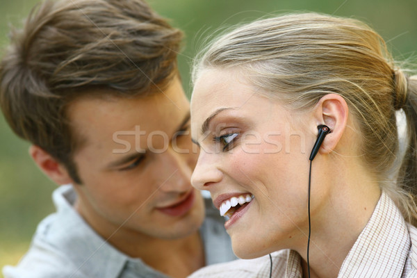Gyönyörű pár hallgat játékos fiatal pér mp3 lejátszó Stock fotó © toocan