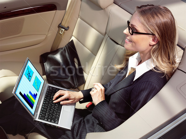 businesswoman has a fan with laptop Stock photo © toocan