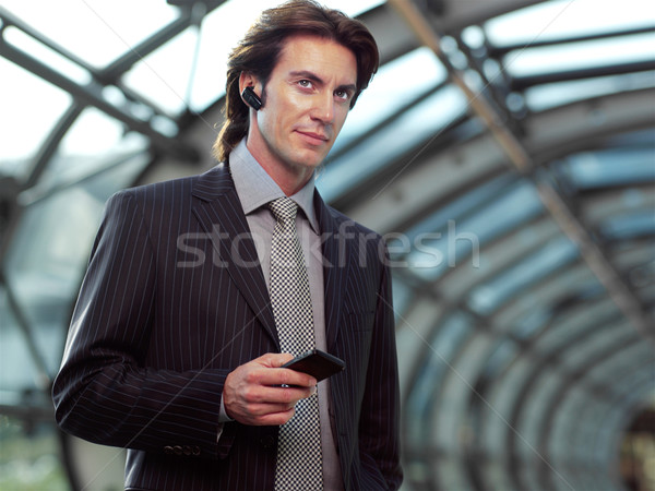 Mówić komórka biznesmen telefonu komórkowego lotniska budynku Zdjęcia stock © toocan