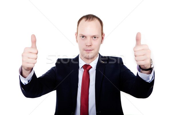 Purposeful businessman. hands clenched into fists and thumbs up. Stock photo © traza