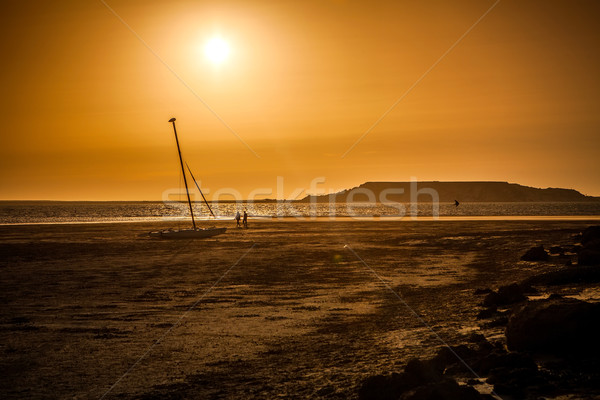 Csónak naplemente katamarán homok nap nyár Stock fotó © trexec