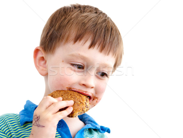 Eating biscuit Stock photo © trgowanlock