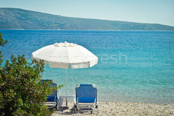 Playa sombrilla Grecia sol paraguas vacaciones Foto stock © trgowanlock