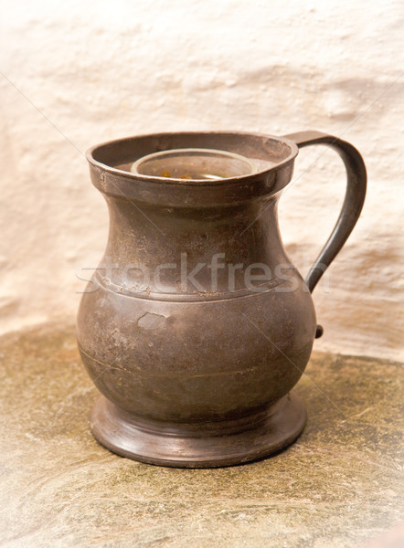 Antique jug Stock photo © trgowanlock