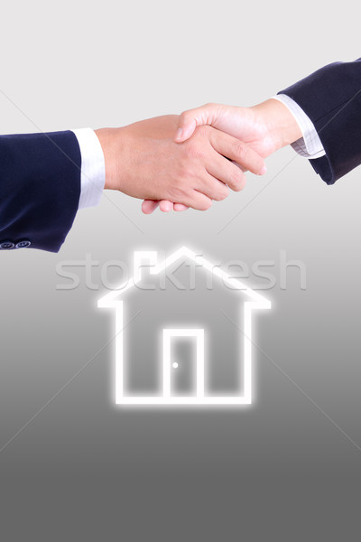 hand shaking and house icon Stock photo © tungphoto