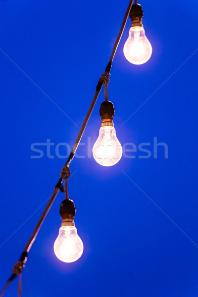 light bulb at dusk Stock photo © tungphoto