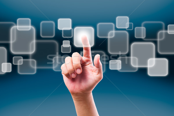 hand pushing button on touch screen Stock photo © tungphoto