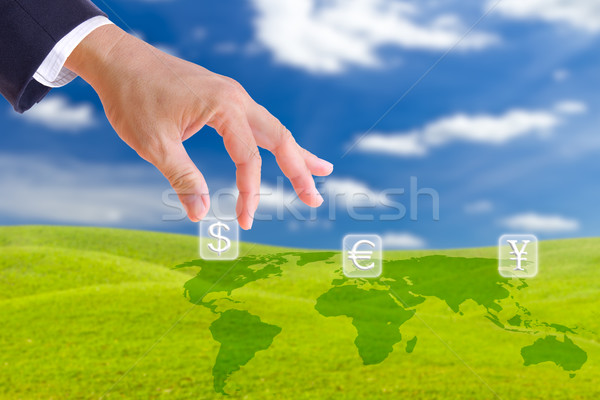 business man hand bring up dollar sign button Stock photo © tungphoto
