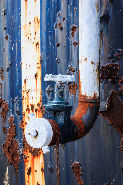 rusty water valve and tank Stock photo © tungphoto