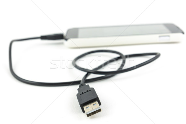 micro usb cable connected to smart phone Stock photo © tungphoto