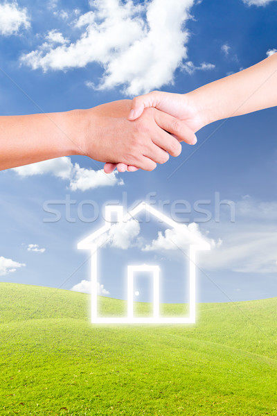 hand shaking and house icon Stock photo © tungphoto