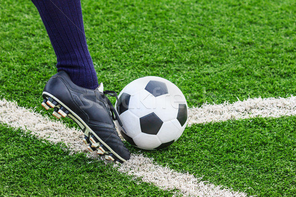 foot kicking soccer ball on corner Stock photo © tungphoto