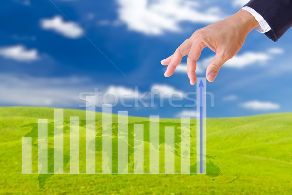 business man hand bring up the graph in blue sky Stock photo © tungphoto