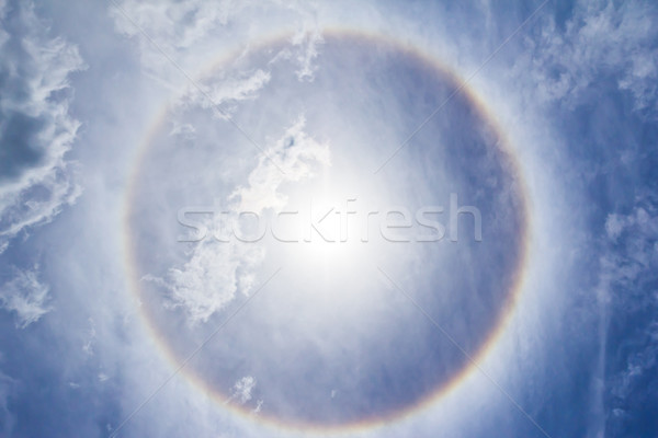 Corona on blue sky, ring around the sun Stock photo © tungphoto