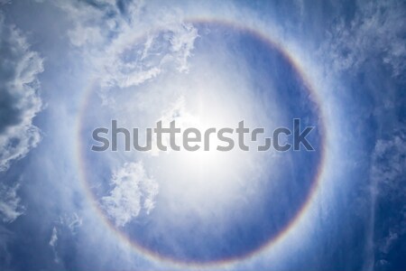 Corona on blue sky, ring around the sun Stock photo © tungphoto