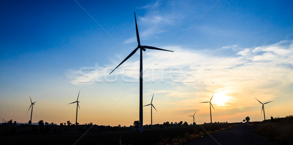 Silhouet windturbine schemering technologie Blauw Stockfoto © tungphoto