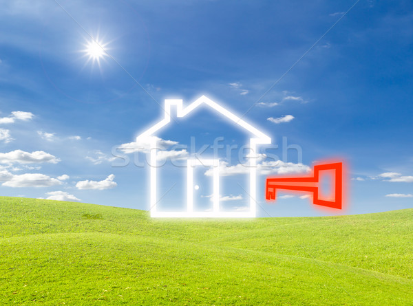 key of house icon on green grass meadow Stock photo © tungphoto