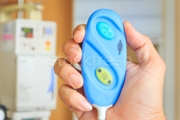 hand holding nurse call button Stock photo © tungphoto