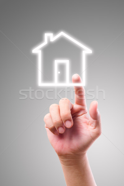 hand pointing to house icon Stock photo © tungphoto