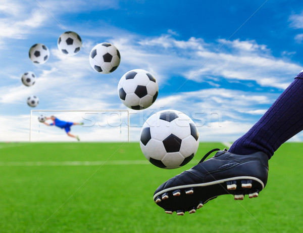 foot kicking soccer ball to goal Stock photo © tungphoto