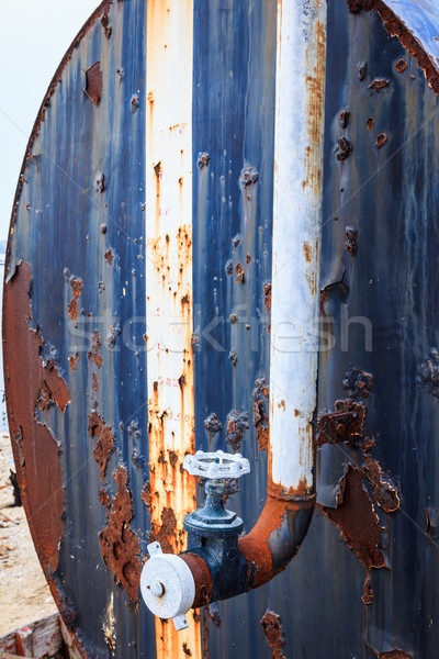 Stock photo: rusty water valve and tank