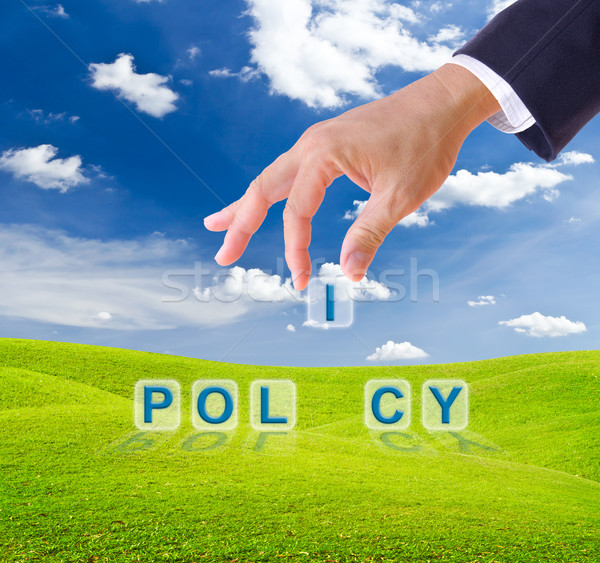 business man hand made policy word buttons Stock photo © tungphoto