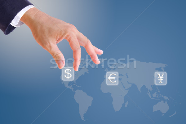 business man hand bring up dollar sign button Stock photo © tungphoto