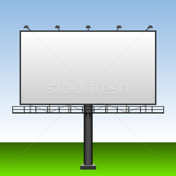 Big blank outdoor advertising billboard with blue sky behind. Stock photo © tuulijumala