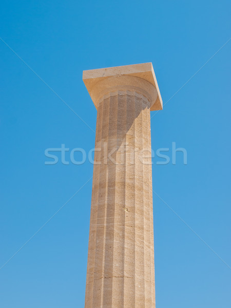 Antique column of Lindos against blue sky background. Stock photo © tuulijumala