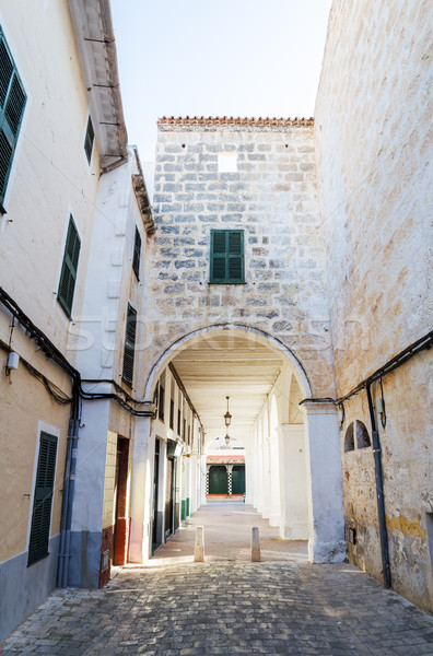 Ciutadella old town narrow street with archway, Menorca, Spain. Stock photo © tuulijumala