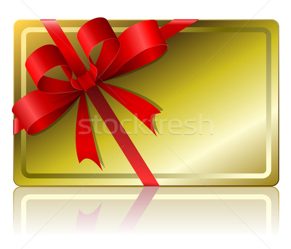 Blank golden gift card with ribbon isolated on white background. Stock photo © tuulijumala