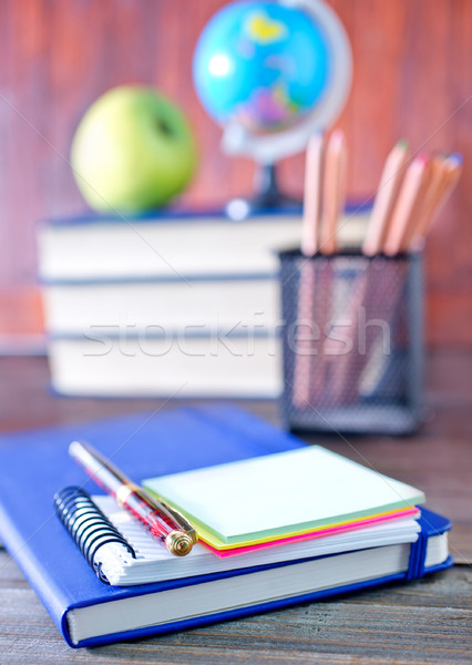 Okul malzemeleri gıda elma kalem meyve kalem Stok fotoğraf © tycoon