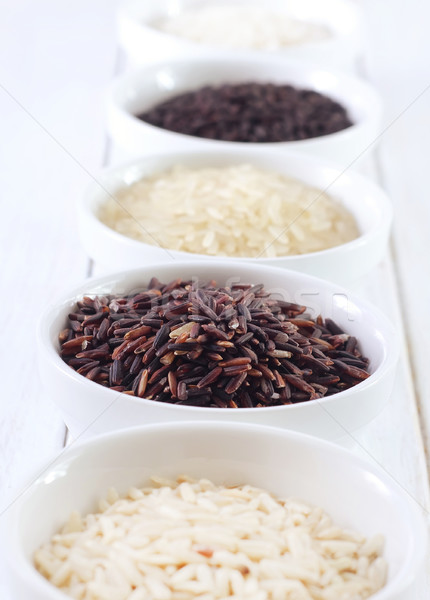Different kind of raw rice, raw rice in the white bowls Stock photo © tycoon