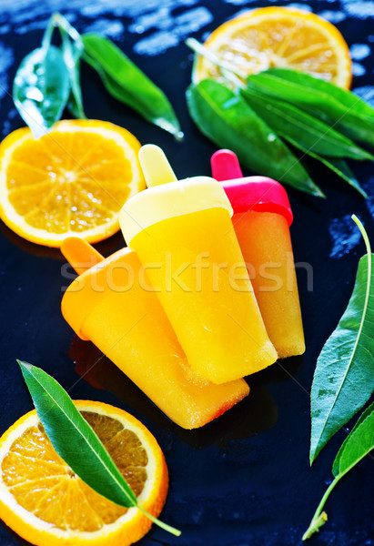 Eigengemaakt oranje icecream zwarte voedsel achtergrond Stockfoto © tycoon