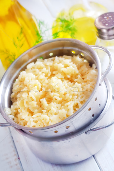 Boiled pasta in the metal bowl Stock photo © tycoon