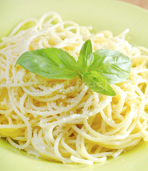 pasta with cheese and basil Stock photo © tycoon