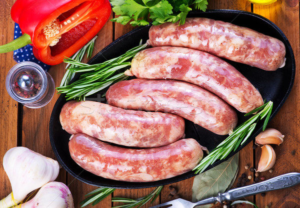 Stock photo: raw sausages