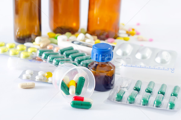 Couleur pilules médicaux bouteille table santé [[stock_photo]] © tycoon