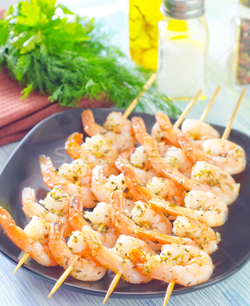 boiled shrimps are beaded on sticks Stock photo © tycoon