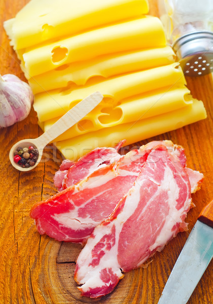 Bacon with cheese on the wooden board Stock photo © tycoon
