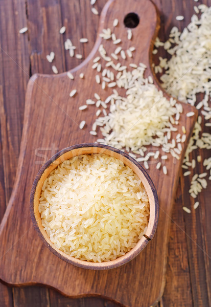 Surowy ryżu żywności drewna tle obiedzie Zdjęcia stock © tycoon