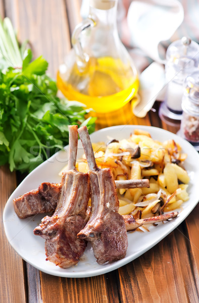 Stock photo: Rack of lamb fried with aromatic olive oil