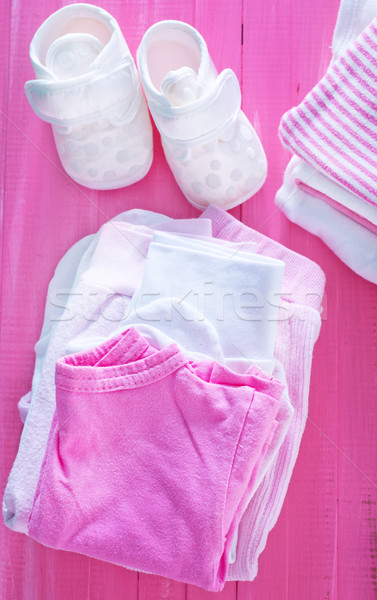 Stockfoto: Baby · kleding · tabel · meisje · papier · achtergrond