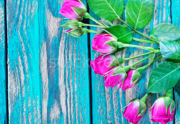 Virágok fából készült vörös rózsák asztal virág tavasz Stock fotó © tycoon