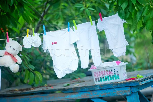Baba ruházat kert család gyermek vásárlás Stock fotó © tycoon