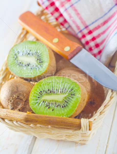 Frescos kiwi alimentos mano frutas cocina Foto stock © tycoon